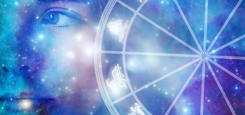 Human eye beside a zodiac wheel in a wide astrology-themed image